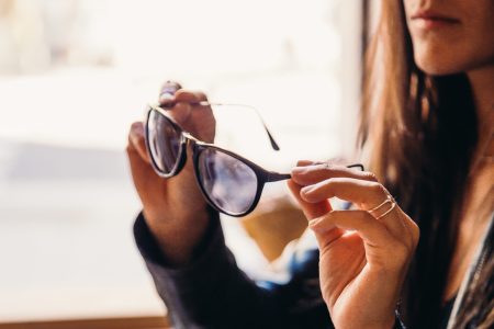 woman-trying-on-sunglasses